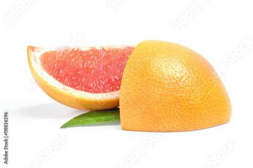 Two slices of grapefruit on white background