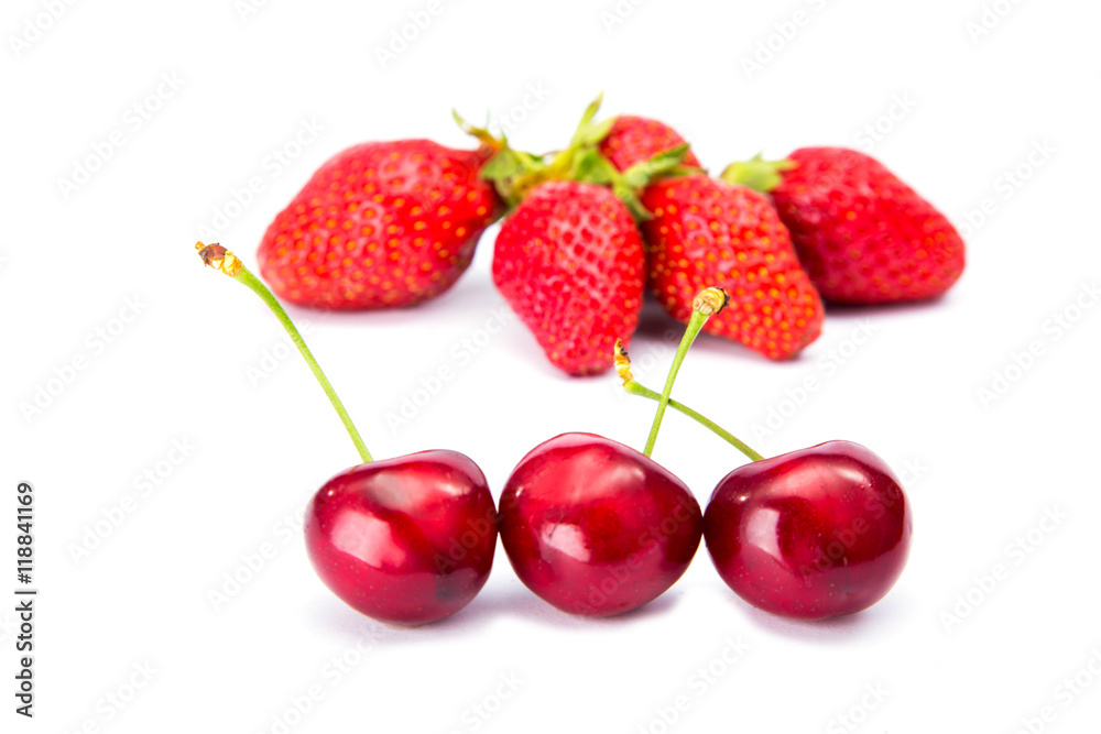 Red Strawberry and red cherry on white background Red Strawberry and red cherry on white background