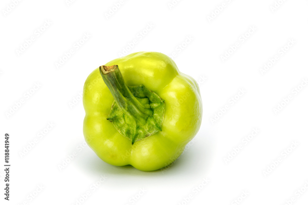 green sweet peppers on a white background green sweet peppers on a white background