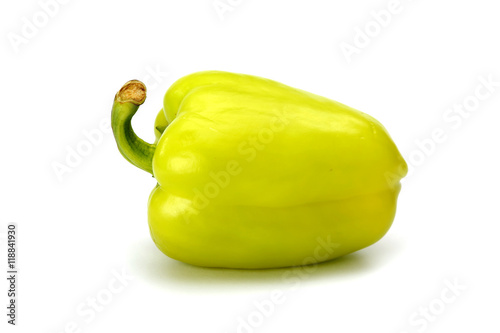 green sweet peppers on a white background
