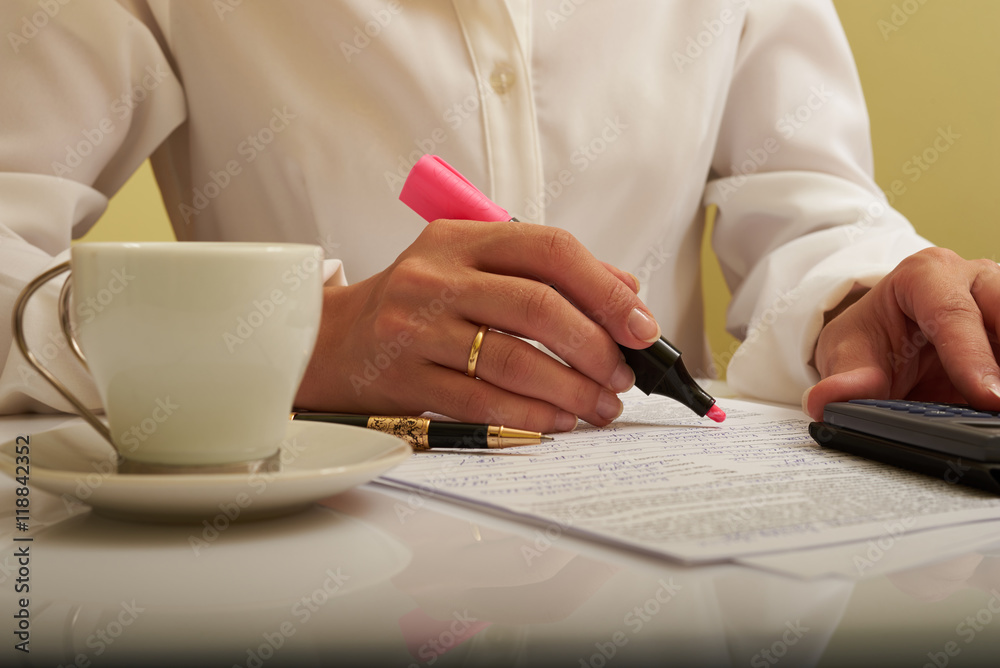 woman working with documents on the table woman working with documents on the table