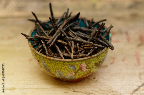 Wellness drink, Bitter Twisted Leaves of Ilex Kudingcha. Green tea Kudin photo