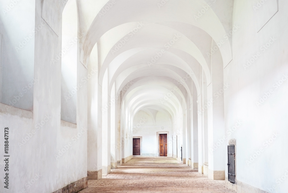 Monastery interior hallway cloister white clean archway, Plasy, Czech republic
