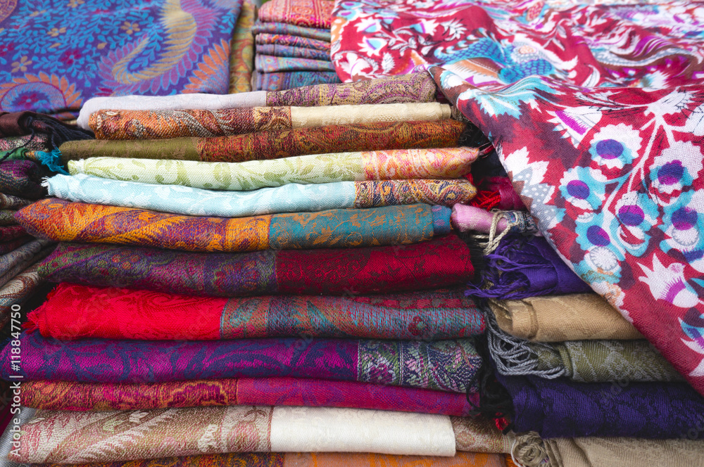 .Selling cloth shawls on a market in eastern Indonesia in Southeast Asia