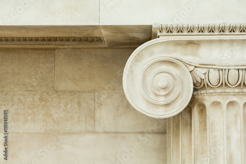 Decorative detail of an ancient Ionic column photo