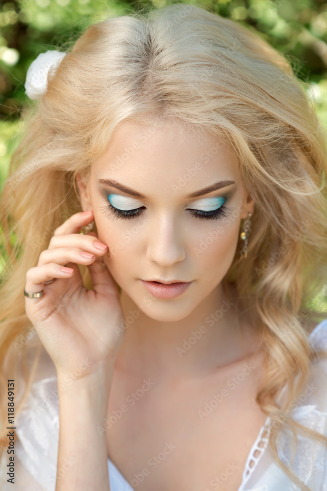 Naklejka premium Beautiful young woman. Make up and hair stiling.