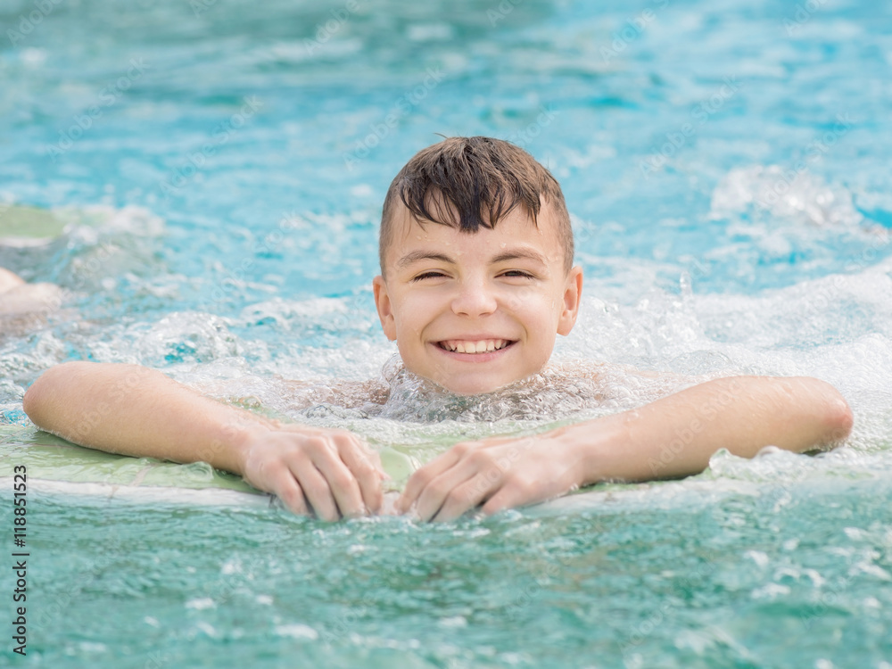 Happy boy in pool