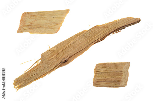 Three hickory smoking chips for barbecue isolated on a white background.