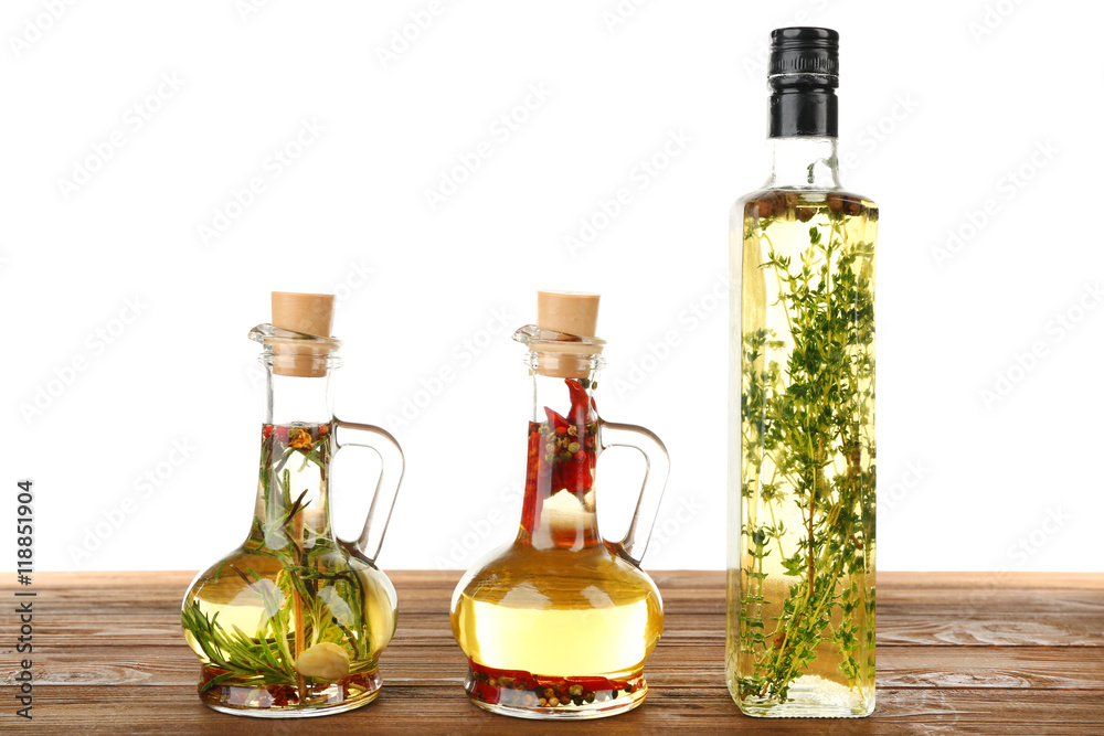 Olive oil with spices, isolated on white
