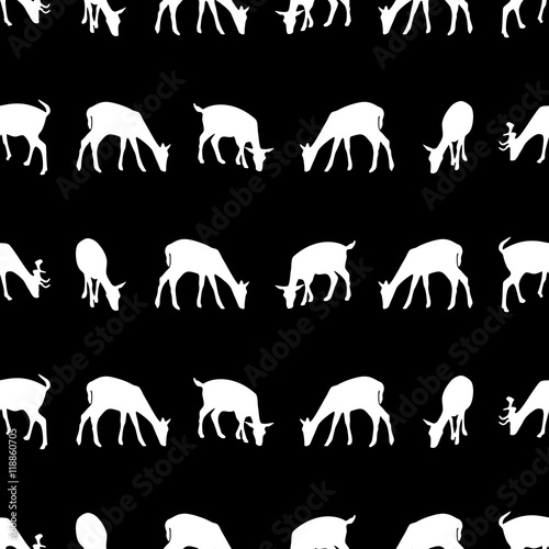 feeding fallow deer silhouette of animal dark seamless pattern eps10