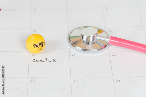 The words Doctor written on a Calendar to Remind you an Importan photo