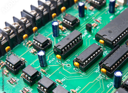 Closeup of electronic circuit board with processor, selective fo