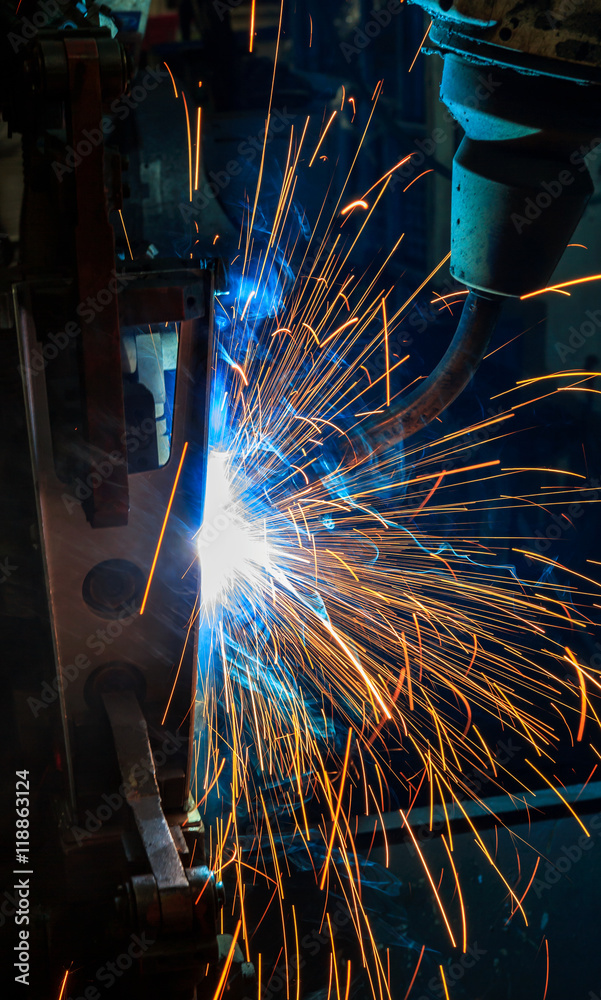 Robot welding automotive part. Robot welding automotive part.