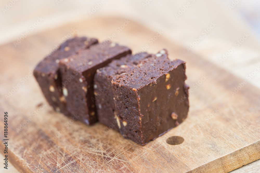 Homemade chocolate brownies over wooden background Homemade chocolate brownies over wooden background