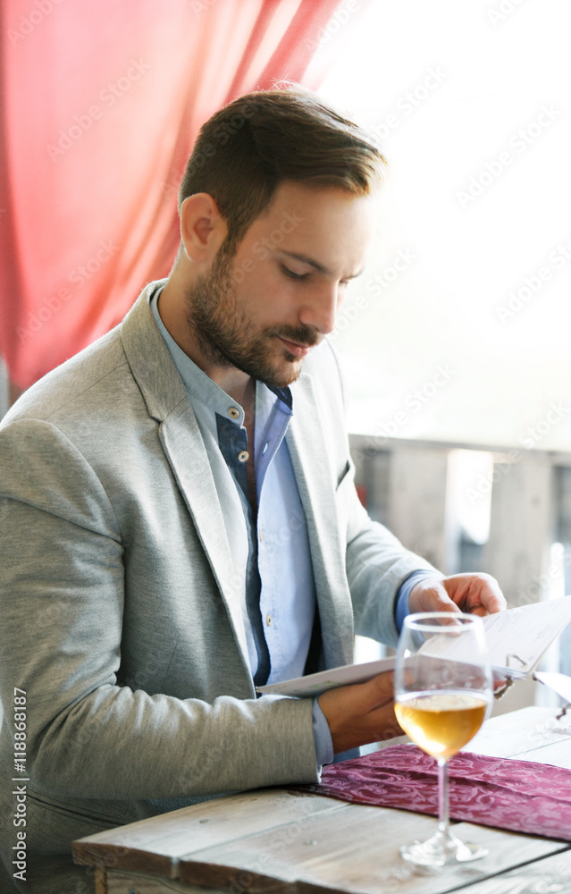 Young man in restaurant.