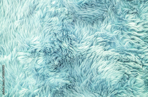 Closeup surface abstract fabric pattern at the light blue fabric carpet at the floor of house texture background