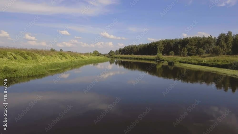 Landscape with river, forest, clouds, blue sky.Aerial view of the water surface of the river.Aerial video.4K,UHD Aerial Rural landscape. Landscape with river, forest, clouds, blue sky.Aerial view of the water surface of the river.Aerial video.4K,UHD Aerial Rural landscape.