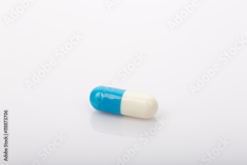white and blue capsule,medical concept