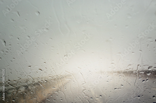Blurry view through the wind shield of rainy day.Selective focus.