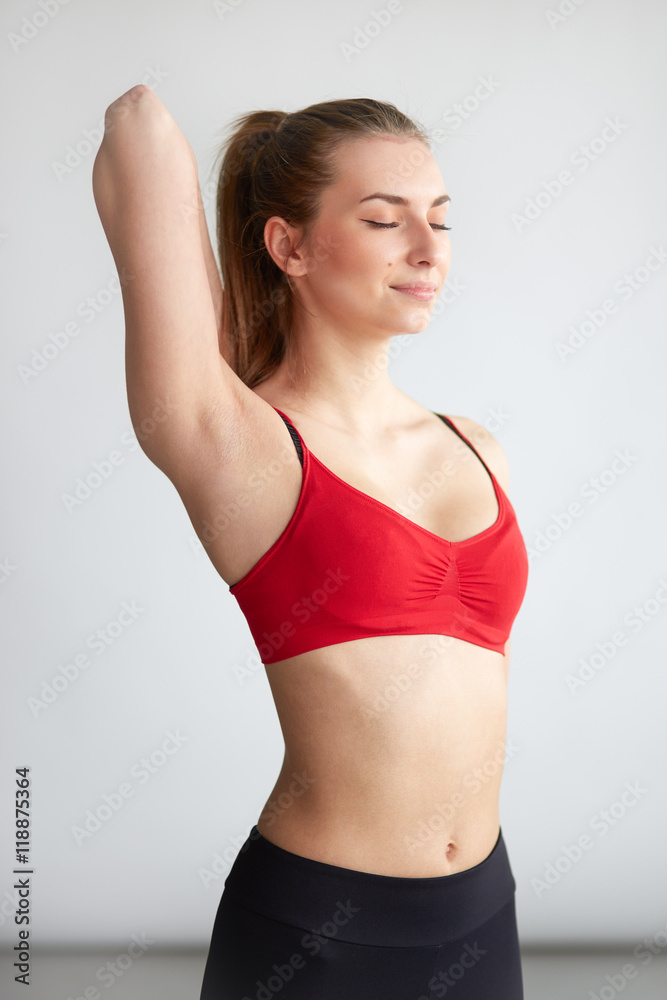 fitness woman stretching arms back