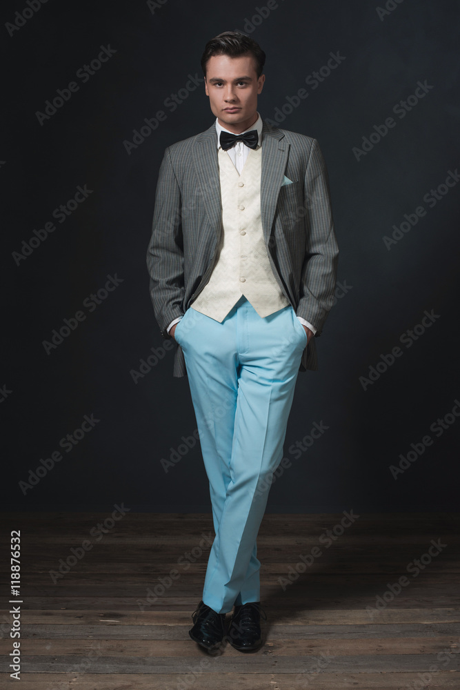 Retro 1920s business man in suit with bow tie. Retro 1920s business man in suit with bow tie.