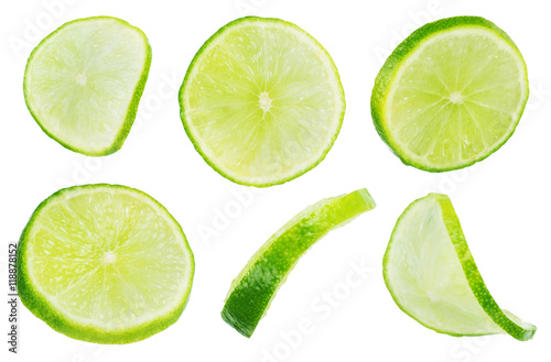 Slice section of green lime isolated over the white background,