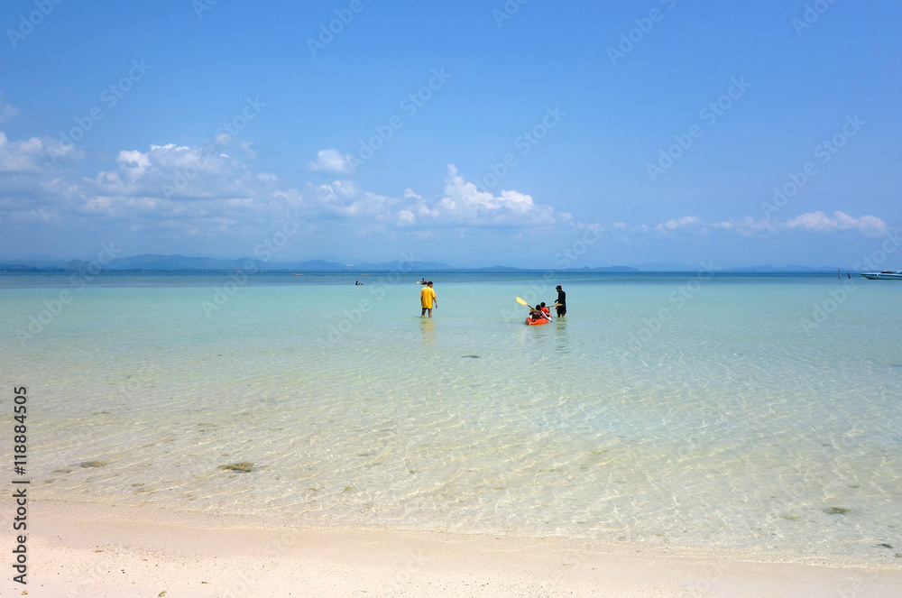 people doing kayak on the clear blue sea, blurred for background usage