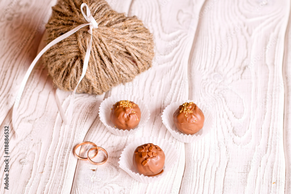 Wedding rings and chocolate sweets Wedding rings and chocolate sweets