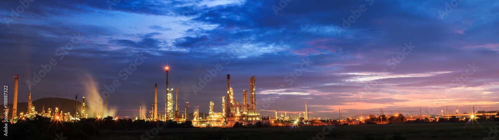 oil refinery with sunrise or twilight in panorama.