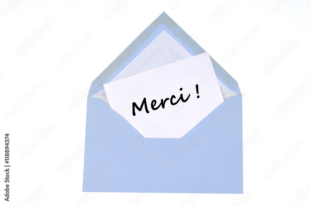 Merci écrit sur une carte mise dans une enveloppe Stock Photo | Adobe Stock