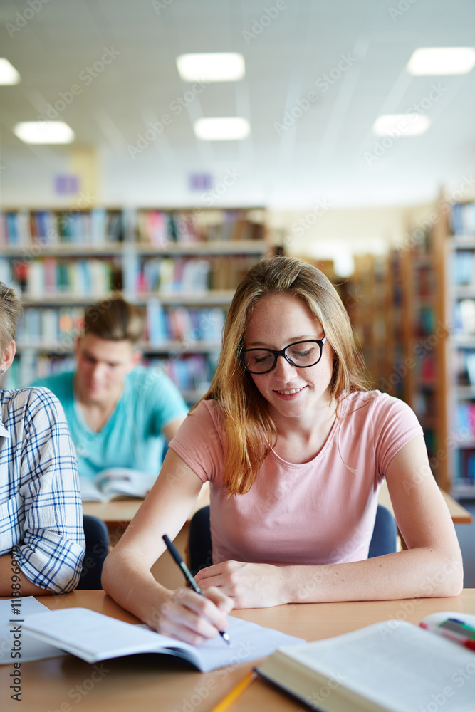 Making notes in copybook Making notes in copybook