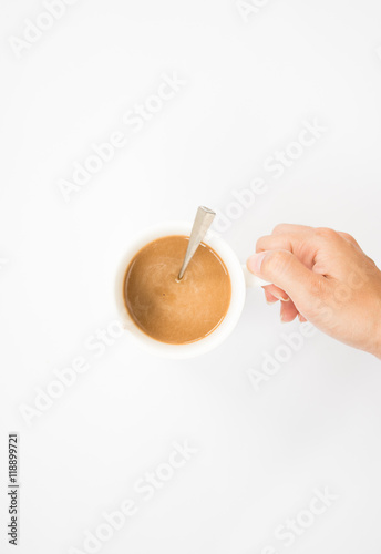 Hand holding a mug isolated