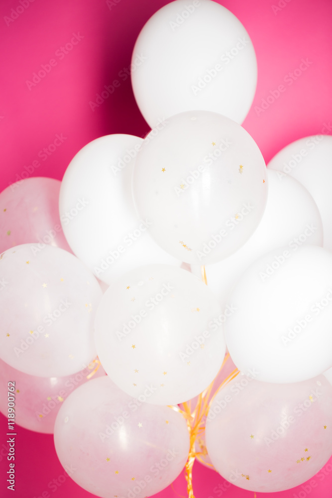 close up of white helium balloons over pink - obrazy, fototapety, plakaty 