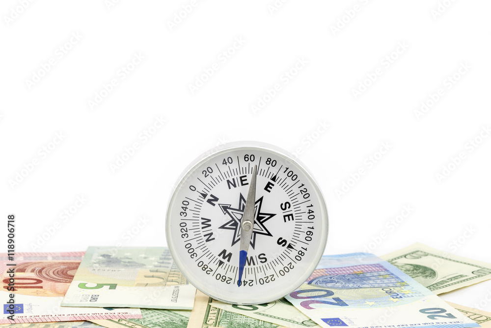 Compass on banknote for financial direction on white background
