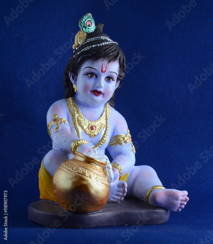 Hindu God Krishna on blue background
