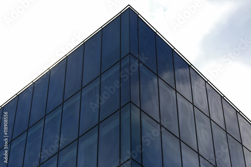 glass facade of the building against the sky
