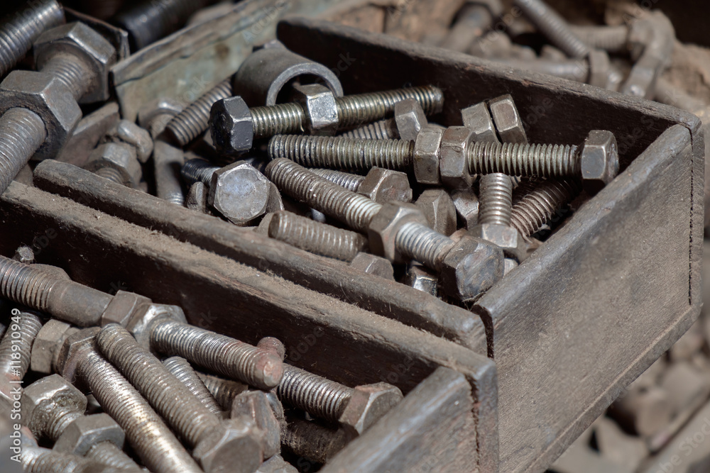 Nuts and bolts / View of dirty nuts and bolts in the factory.