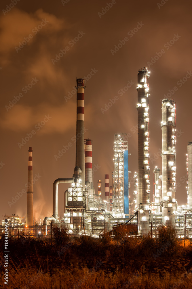 Obraz premium Refinery industrial plant with Industry boiler at night
