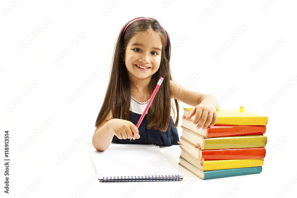 Beautiful girl with school books on the table. Isolated on white background
Beautiful girl with school books on the table. Isolated on white background