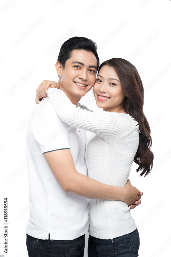 Copy-spaced portrait of a young couple in-love smiling and looki Copy-spaced portrait of a young couple in-love smiling and looki
