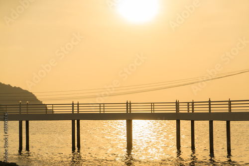 bridge and sea with sunrise light