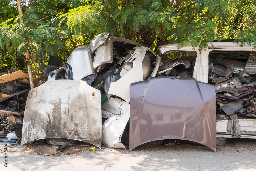 Crushed van in car graveyard