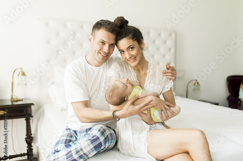Happy family with newborn baby