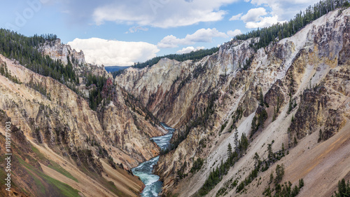 View at a vivid Grand Canyon of the Yellowstone and Yellowstone river. Brink of the Lower Falls on the Grand Canyon of the Yellowstone, Yellowstone National Park, Wyoming