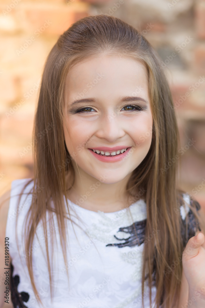 fashion photo of a beautiful girl on a background of brick ruin fashion photo of a beautiful girl on a background of brick ruin
