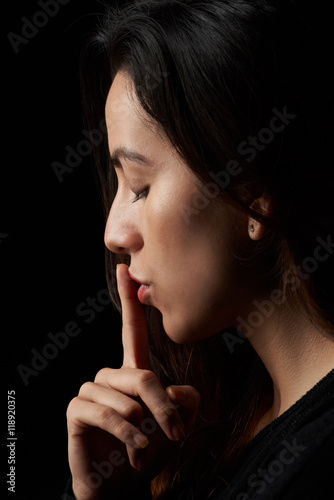 profile of woman with finger