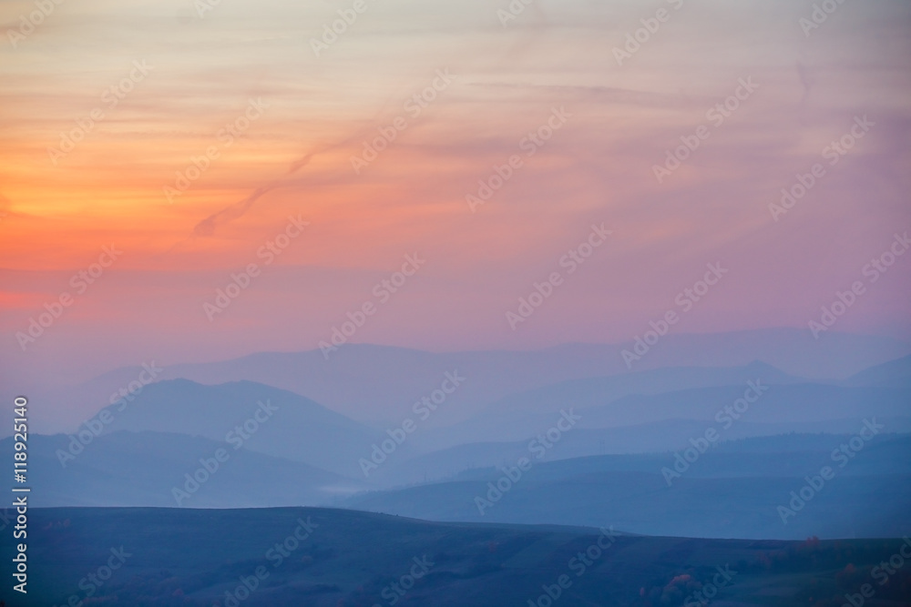 November misty sunset in Carpathian mountains