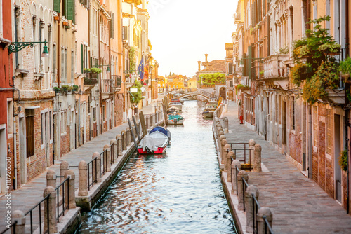 Small romantic water canal in Dorsoduro region in Venice photo