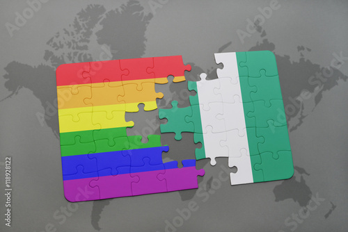 puzzle with the national flag of nigeria and gay rainbow flag on a world map background.