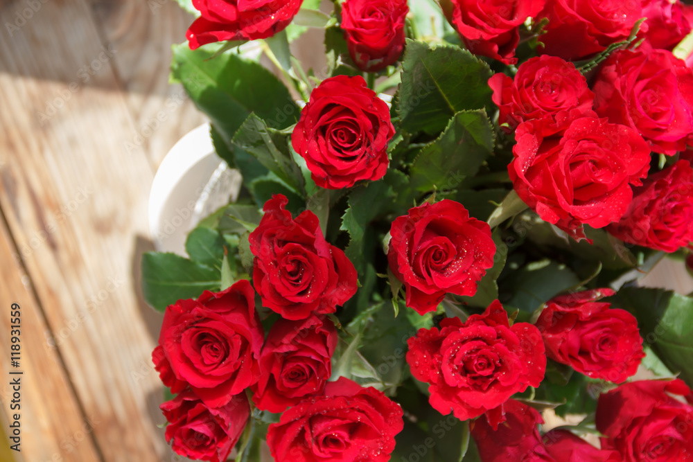 The bouquet of red roses in a vase